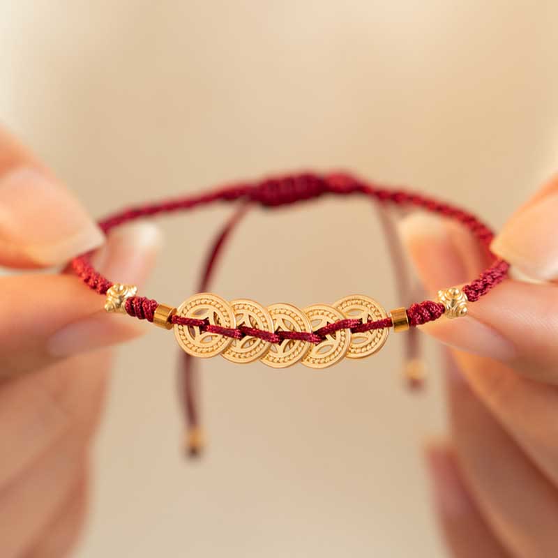 Kupfermünzen-Armband mit roter Schnur für Glück und Schutz