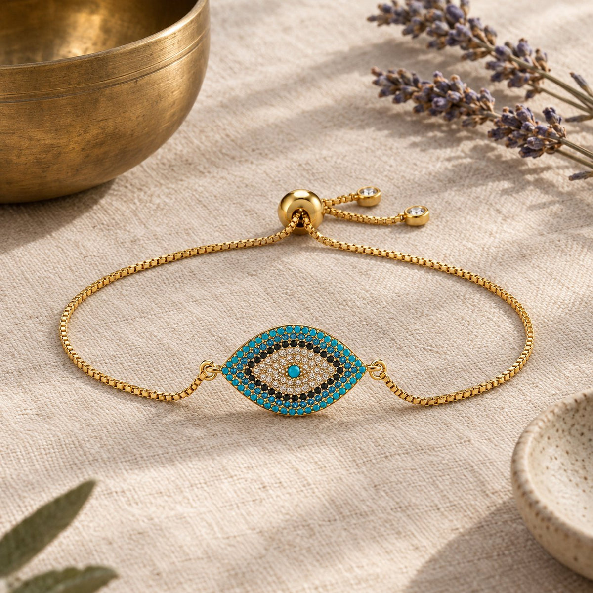 Copper Evil Eye Protection Bracelet, styled with a singing bowl and lavender