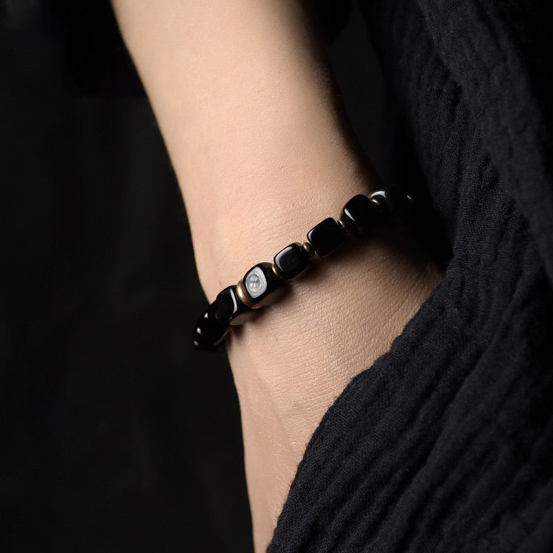 Heilarmband aus Kupfer und Obsidian zum Schutz