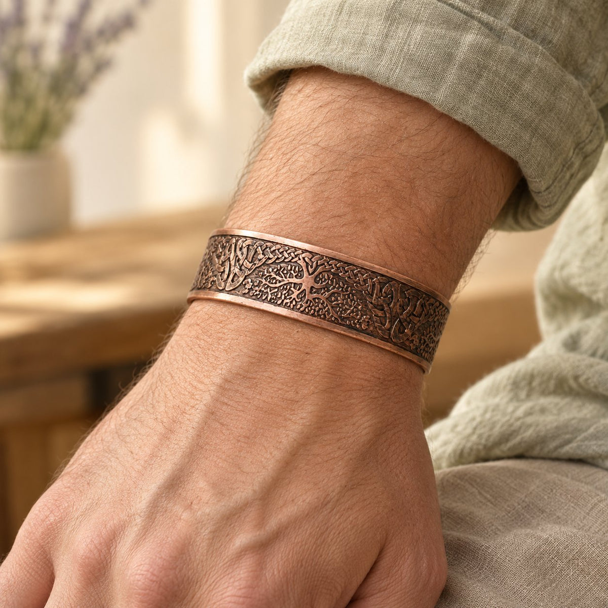 Copper Tree of Life Adjustable Cuff Bracelet for Balance, worn on the wrist by a man