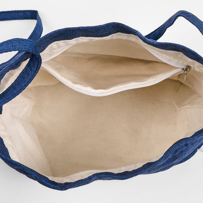 Marineblaue Umhängetasche aus Baumwollleinen mit Kranichmotiv
