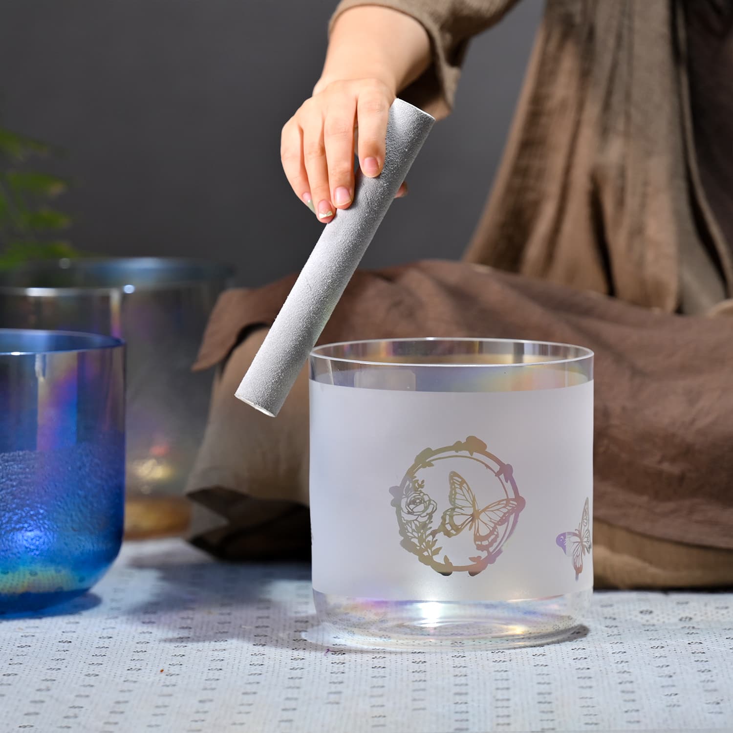 Frosted glass tumbler with circular design for Crystal Singing Bowl Butterfly Alchemy