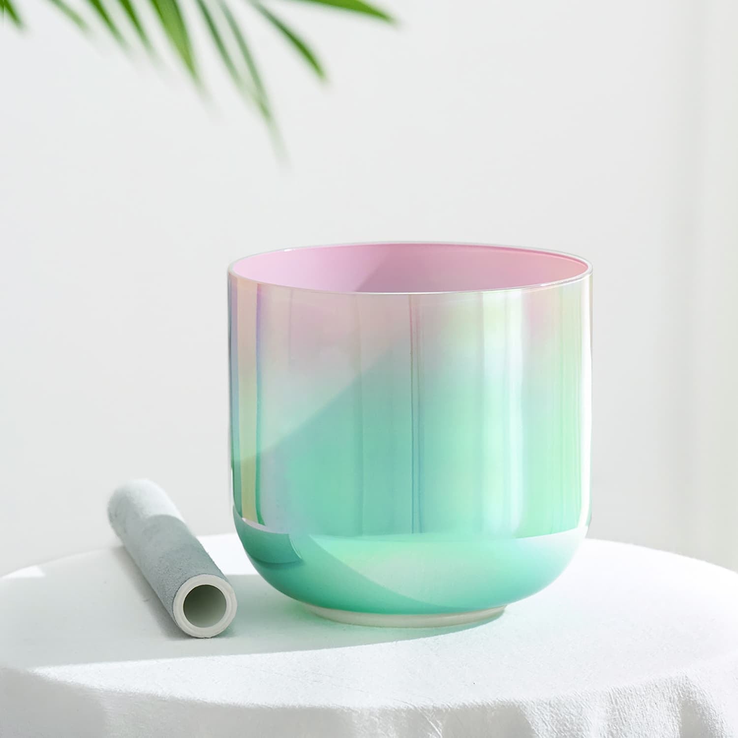 Gradient-colored ceramic pot in mint green and pink for Crystal Singing Bowl sound healing