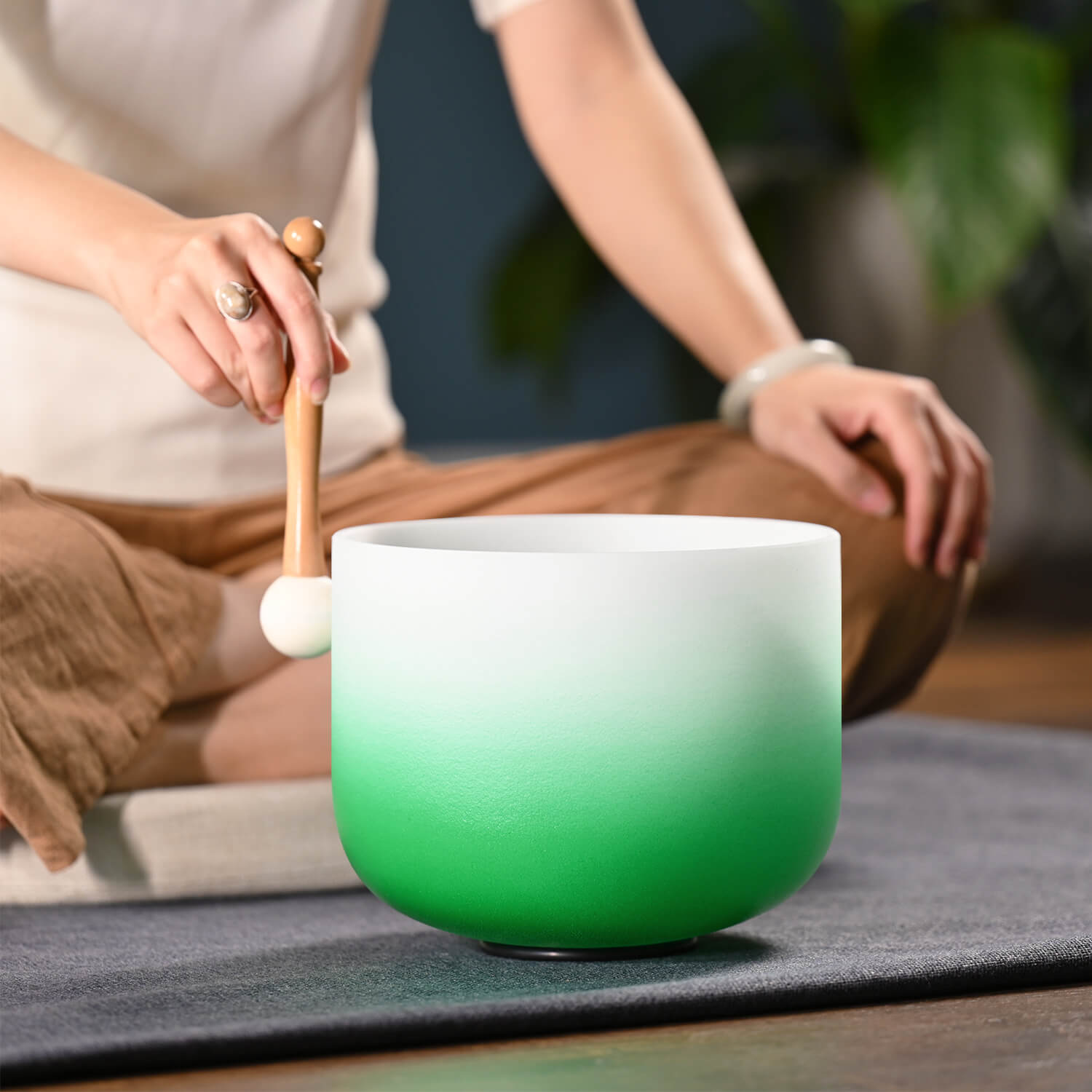 White and green gradient Crystal Singing Bowl with mallet for Heart Chakra healing