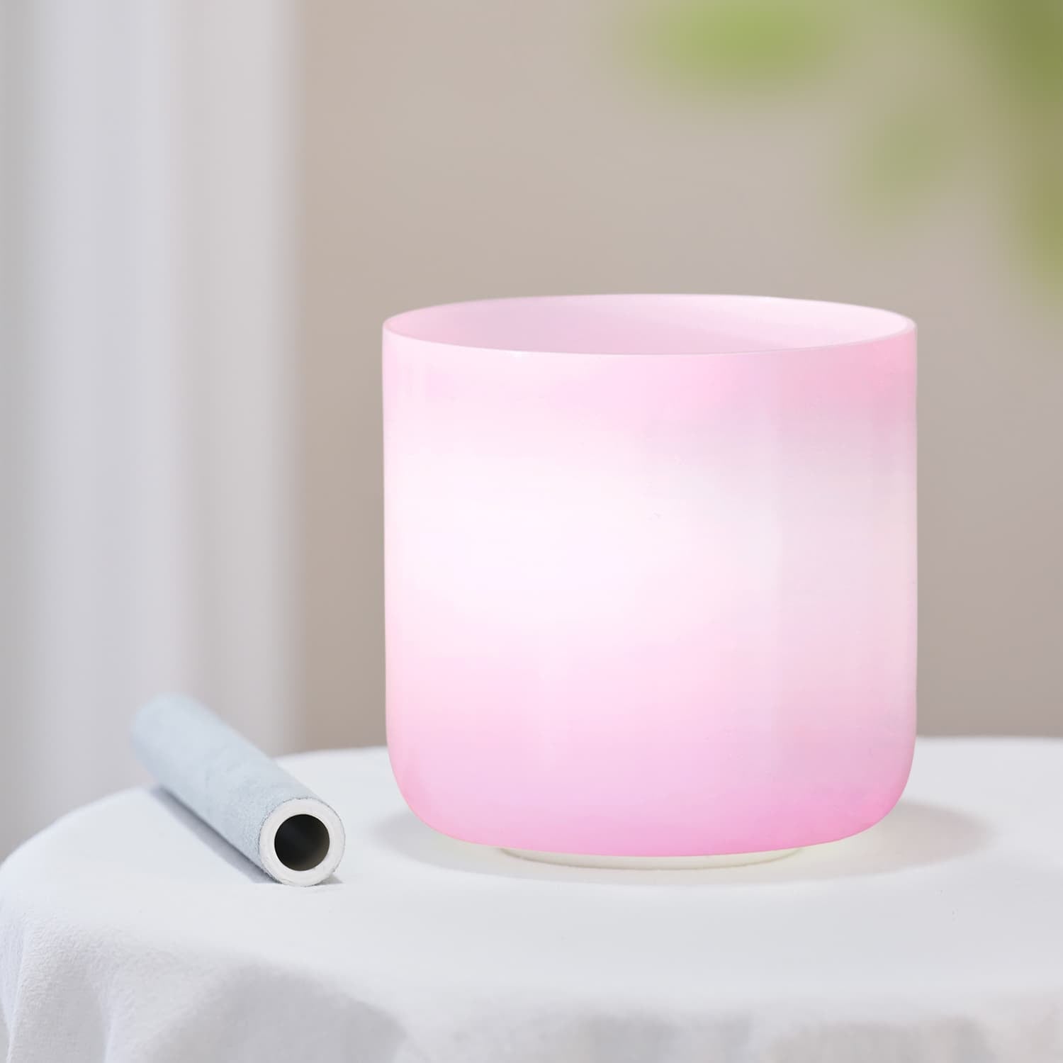 Pink frosted glass candle holder glowing softly with Crystal Singing Bowl Pink Alchemy