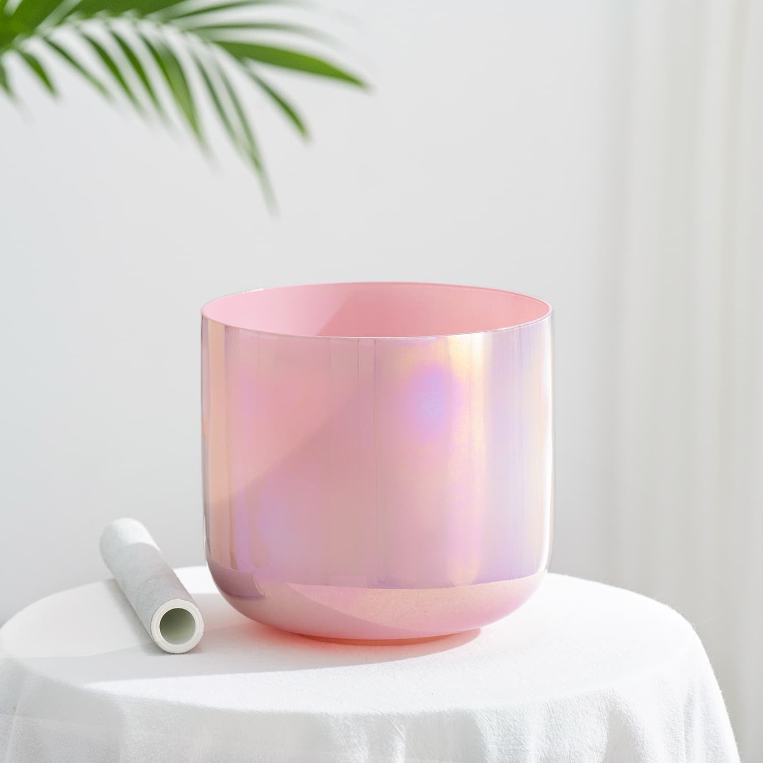 Pink iridescent Crystal Singing Bowl Rosette Nebula with white striker mallet for healing