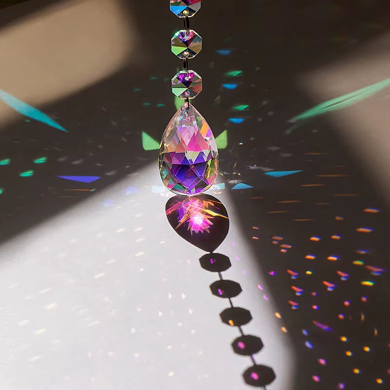 Crystal Wind Chime Suncatcher capturing light and creating vibrant rainbow reflections