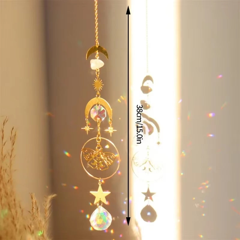 Decorative golden sun and moon crystal suncatcher with iridescent orbs and stars