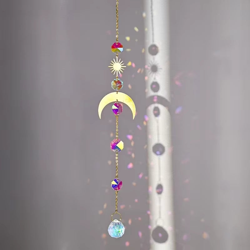Hanging crystal suncatcher featuring moon and star shapes with colorful beads