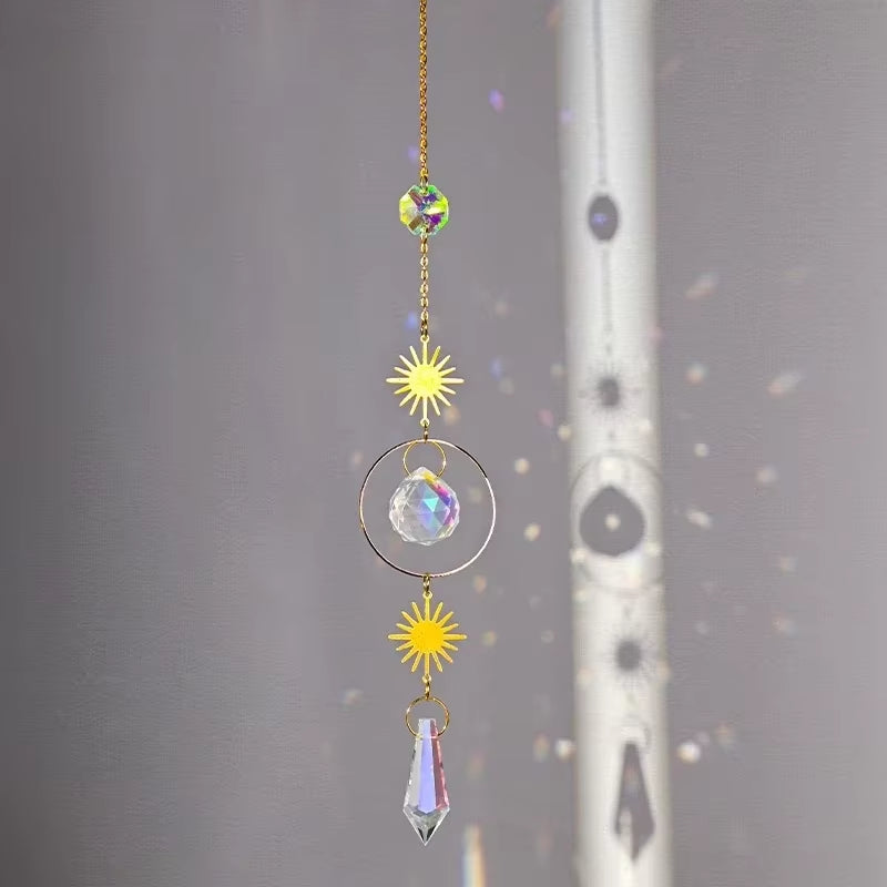 Hanging crystal suncatcher with golden stars and rainbow prisms for outdoor decor
