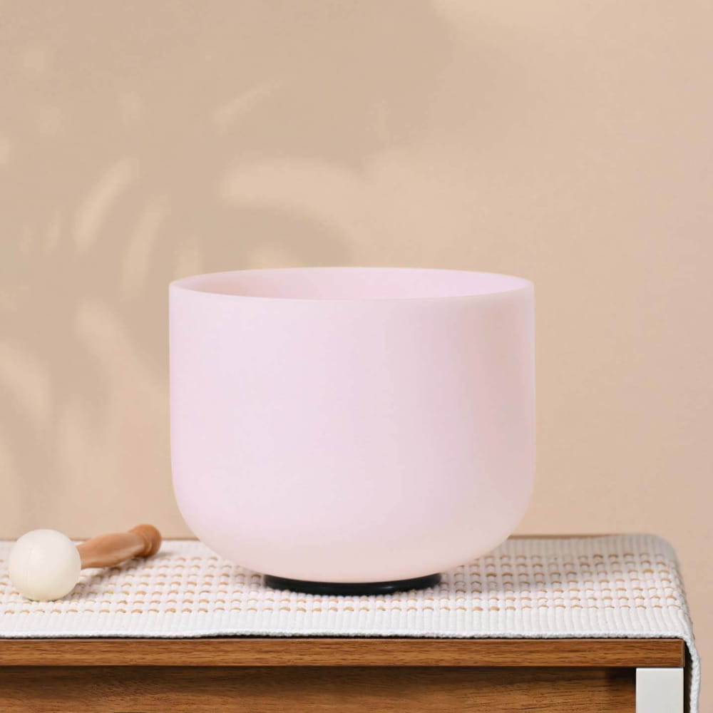 White ceramic bowl with rounded bottom in D Note Pink Rose Quartz Fusion Singing Bowl