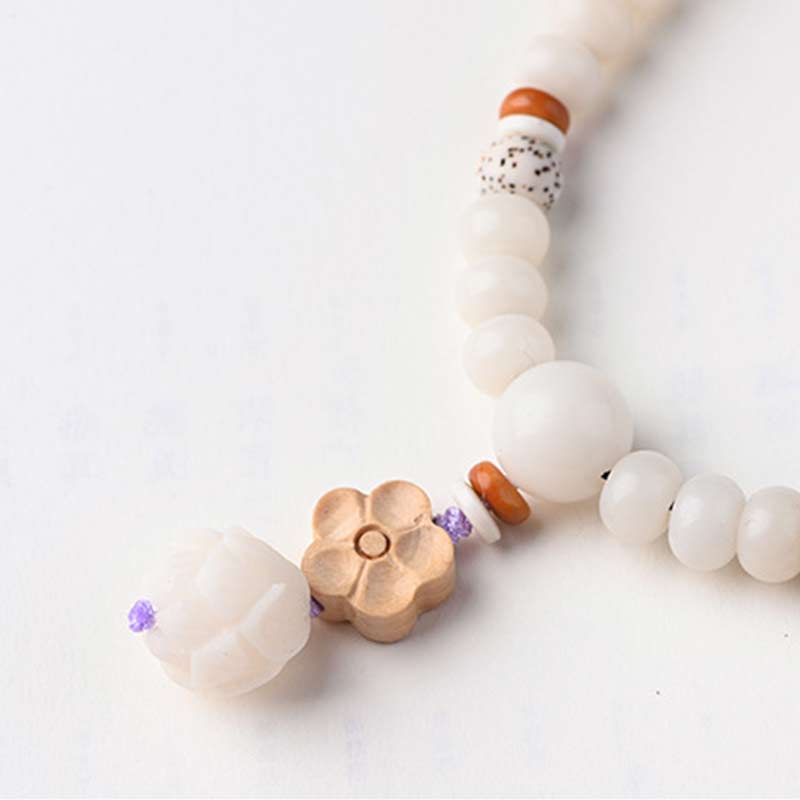 Unisex-Lotusarmband mit weißer Jade, Bodhi-Samen und Segen