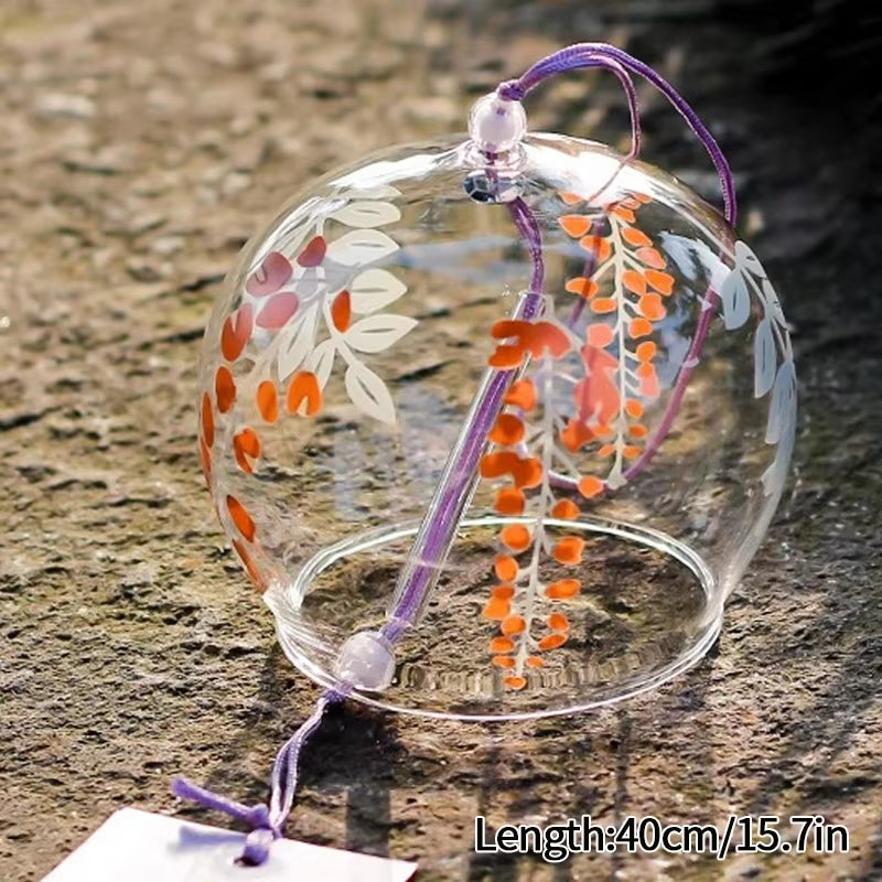 Japanese Glass Wind Chime featuring orange and white floral designs for outdoor decor