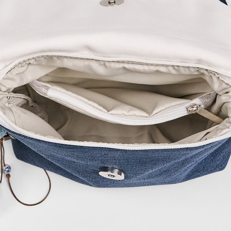 Dunkelblauer, pflaumenfarbener Canvas-Rucksack mit Stickerei