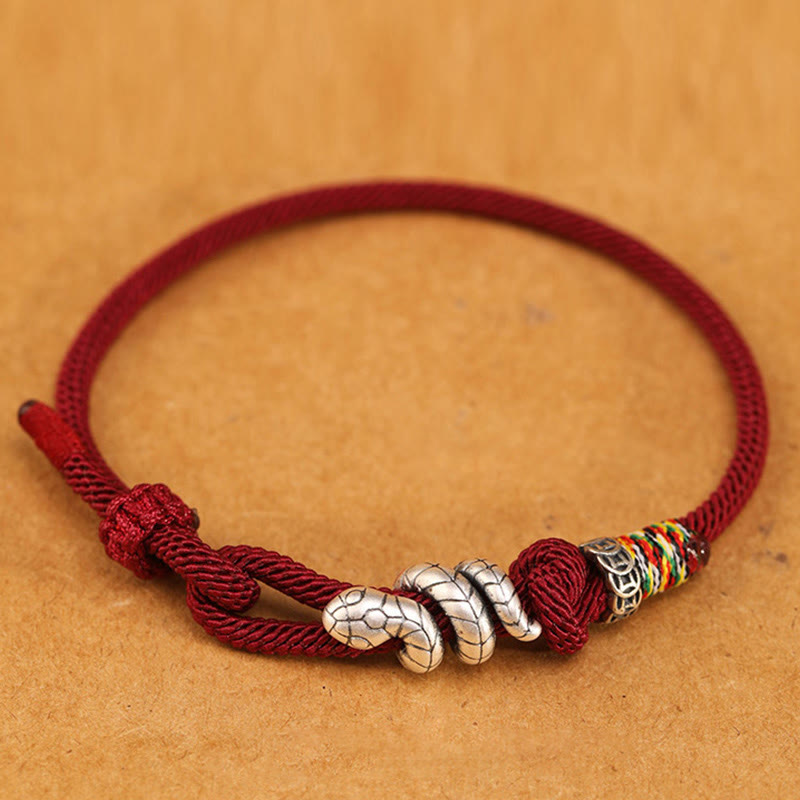 Dunkelrotes 14–17 cm großes Sterlingsilber-Armband mit Schlangenmünze und roter Schnur