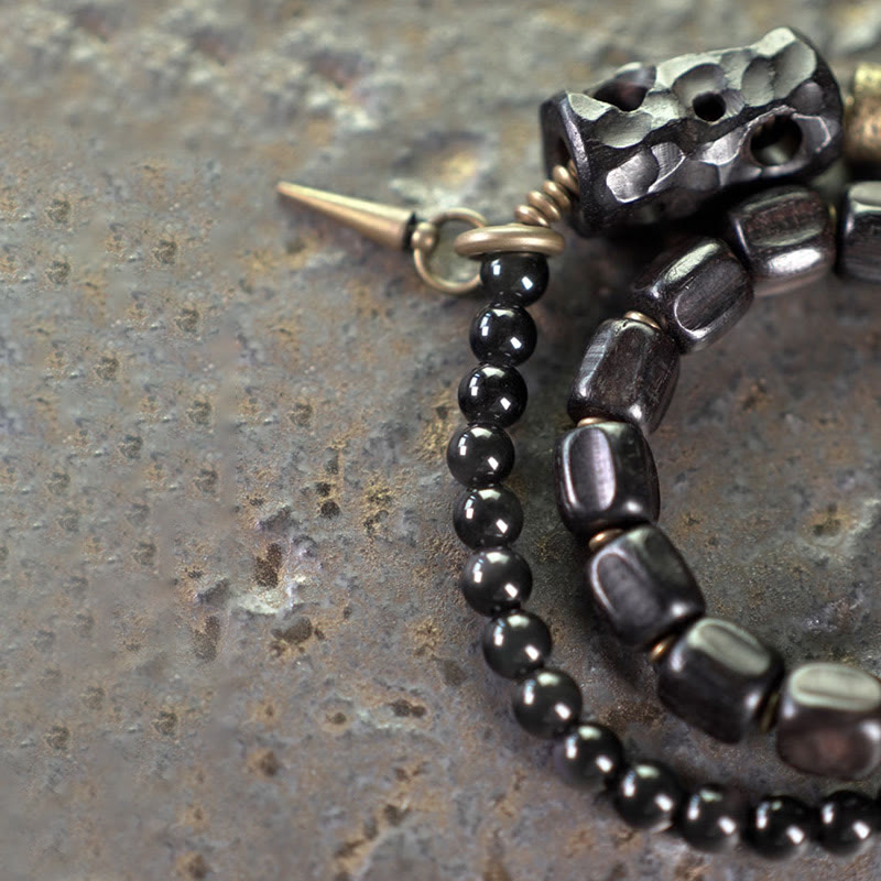 Doppelt gewickeltes Armband aus Ebenholz und schwarzem Obsidian für den Frieden