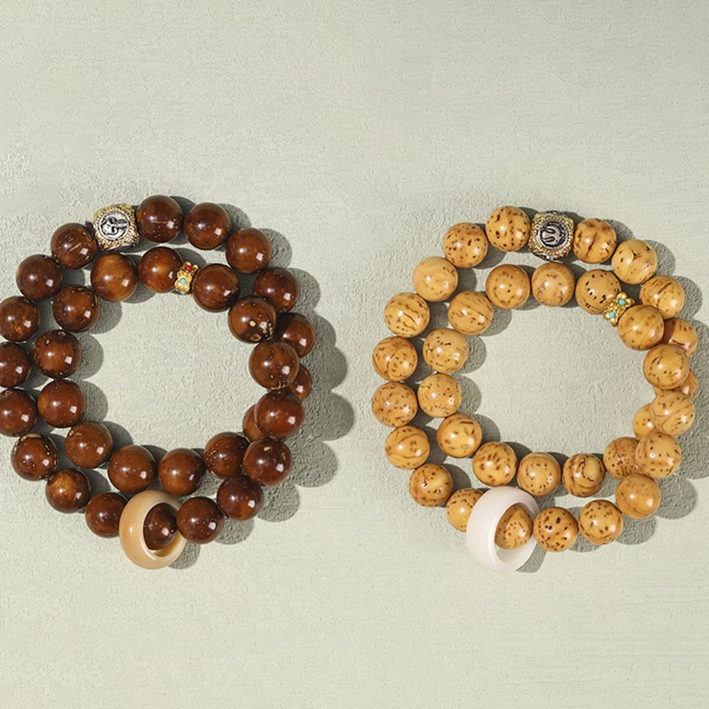 Doppelt gewickeltes spirituelles Armband mit Rattenreichtum und Bodhi-Samen in Lila und Gold