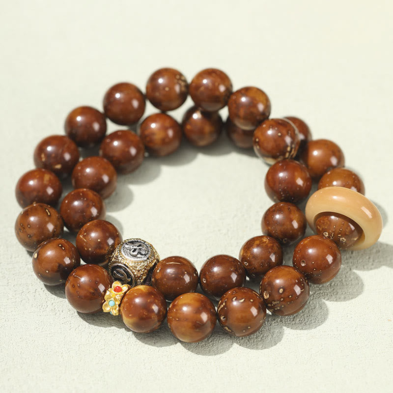 Doppelt gewickeltes spirituelles Armband mit Rattenreichtum und Bodhi-Samen in Lila und Gold