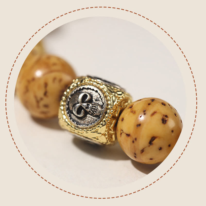 Doppelt gewickeltes spirituelles Armband mit Rattenreichtum und Bodhi-Samen in Lila und Gold