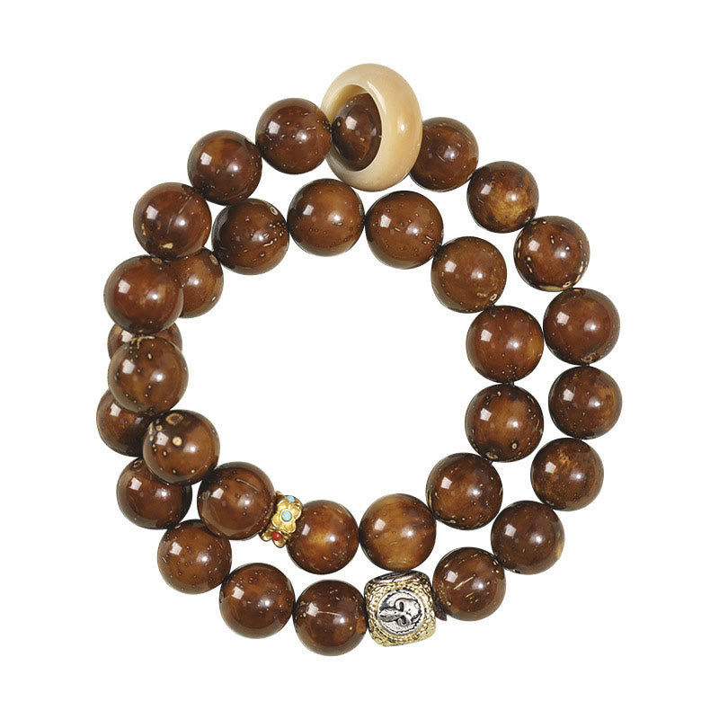 Doppelt gewickeltes spirituelles Armband mit Rattenreichtum und Bodhi-Samen in Lila und Gold