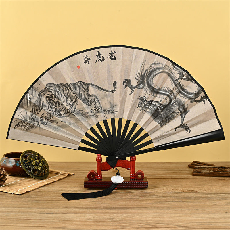 Faltfächer mit Drachen-, Phönix- und Tiger-Kranich-Motiv und Lotus-Quaste