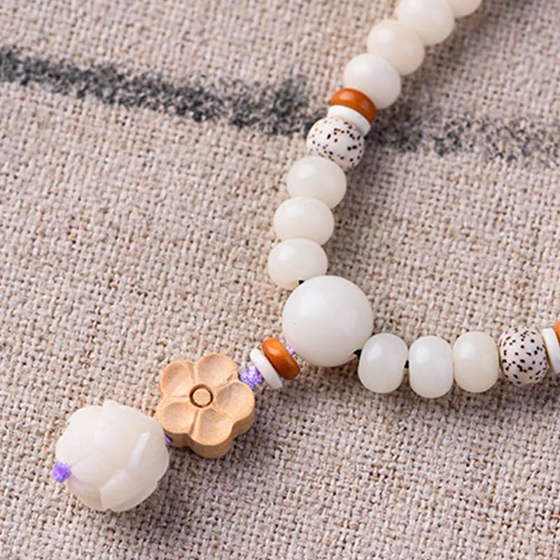 Unisex-Lotusarmband mit weißer Jade, Bodhi-Samen und Segen