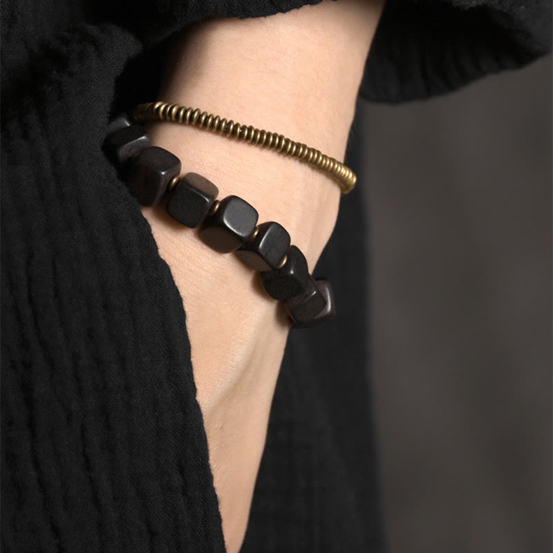 Ebenholz Kupfer Peace Doppelwickel spirituelles Armband