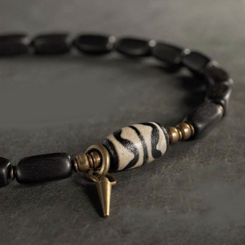Doppelt gewickeltes Armband aus Ebenholz mit Dzi-Perlen für Balance