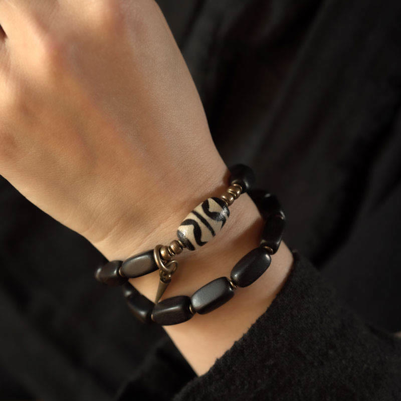 Doppelt gewickeltes Armband aus Ebenholz mit Dzi-Perlen für Balance