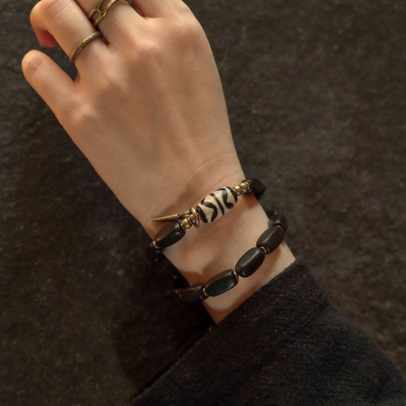 Doppelt gewickeltes Armband aus Ebenholz mit Dzi-Perlen für Balance
