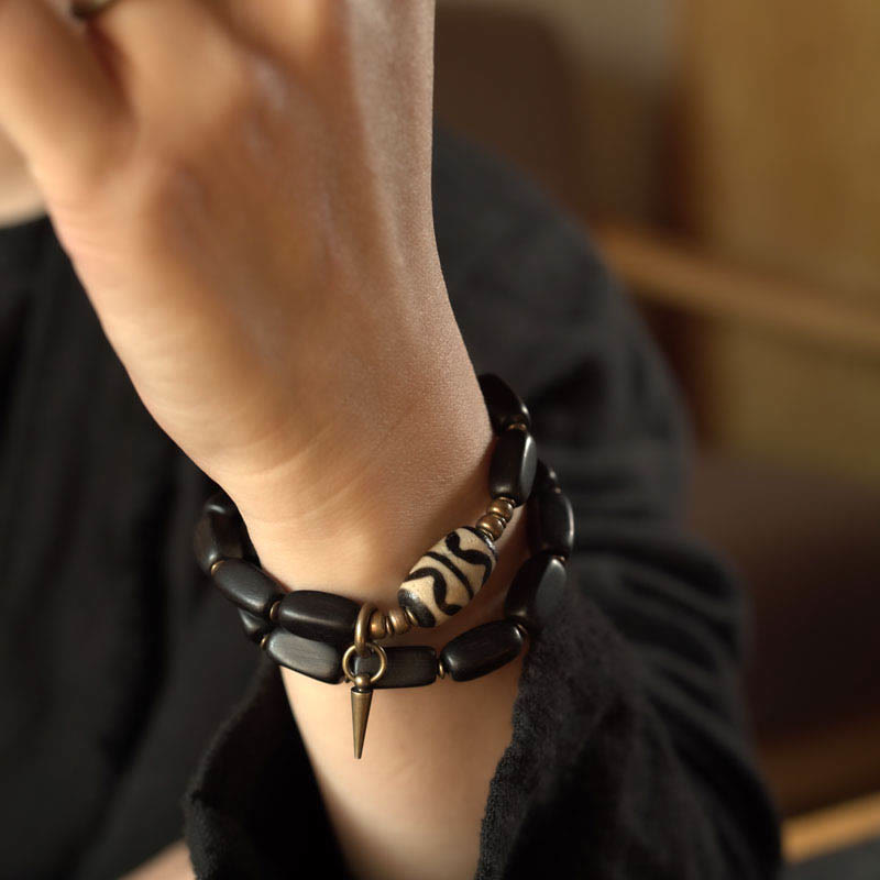 Doppelt gewickeltes Armband aus Ebenholz mit Dzi-Perlen für Balance