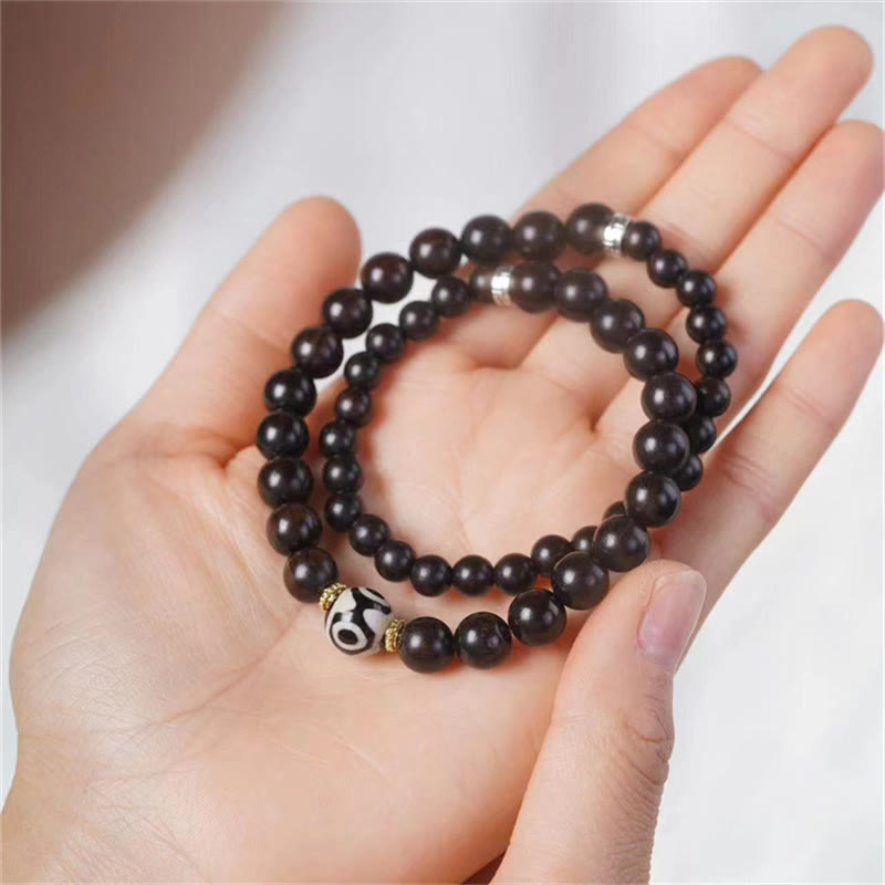 Doppelt gewickeltes Armband aus Ebenholz-Dzi-Perlen für Balance