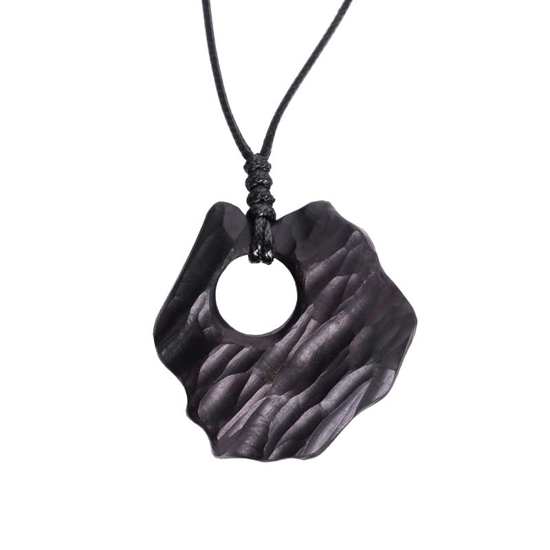 Spirituelle Halskette aus Ebenholz mit hohlem Balance-Anhänger