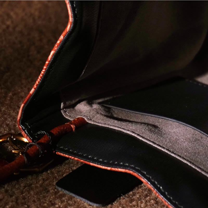 Bestickte Xiangyunsha-Seiden-Umhängetasche mit Bambus- und Pflaumenblüten