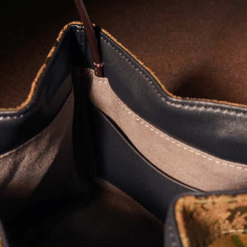 Bestickte Xiangyunsha-Seiden-Umhängetasche mit Bambus- und Pflaumenblüten