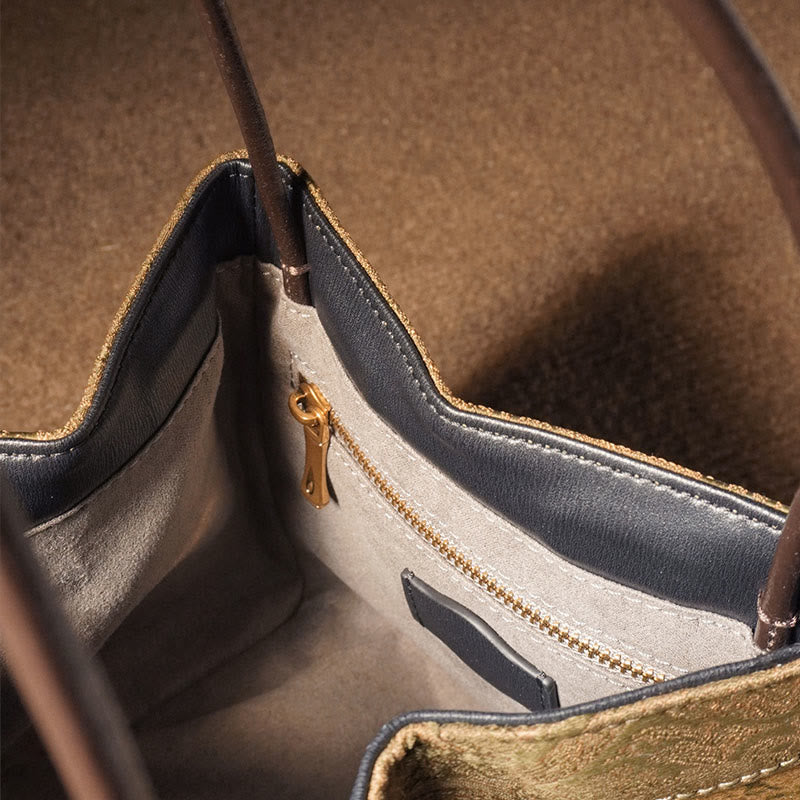 Bestickte Xiangyunsha-Seiden-Umhängetasche mit Bambus- und Pflaumenblüten