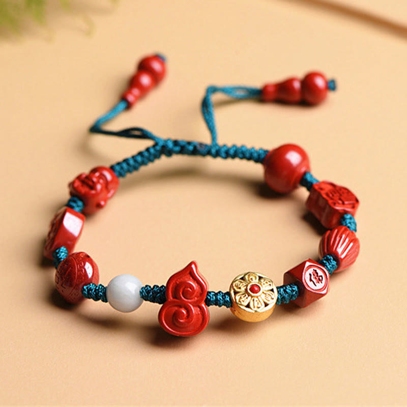 Natürliches Zinnober-Armband mit Om Mani Padme Hum-Segen