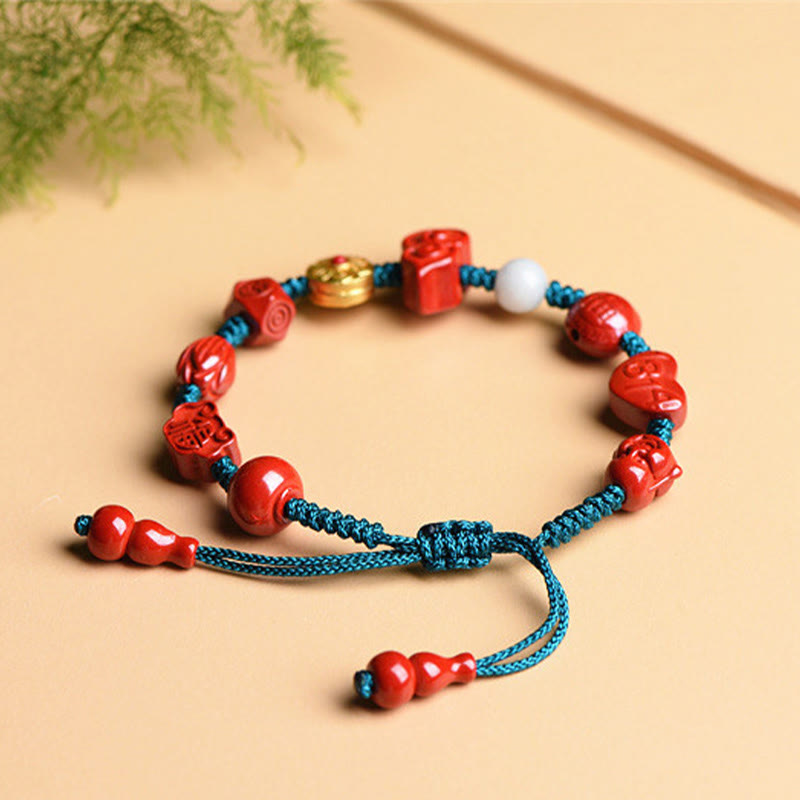 Natürliches Zinnober-Armband mit Om Mani Padme Hum-Segen
