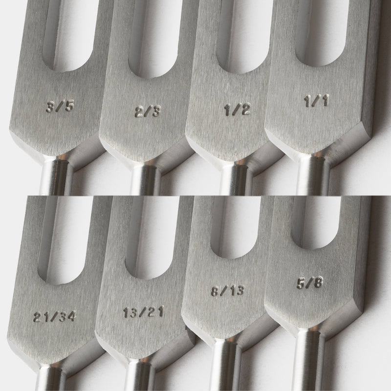 Fibonacci Healing Tuning Fork Set of 8 with engraved frequency markings on metal forks