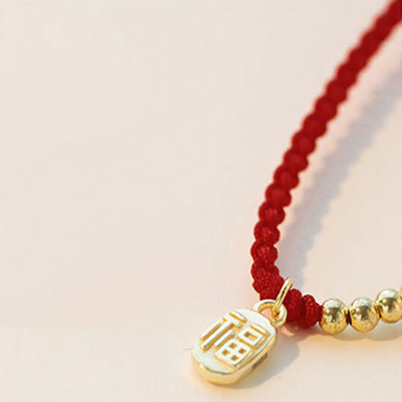Rotes Armband mit Fu-Charakter für Glück und Schutz