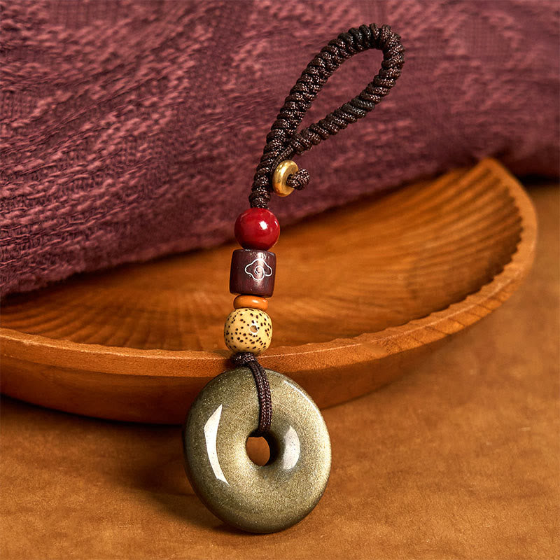 Goldglänzender Obsidian-Schlüsselanhänger mit Peace-Schnalle zum Schutz