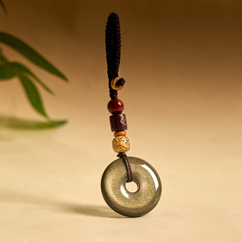 Goldglänzender Obsidian-Schlüsselanhänger mit Peace-Schnalle zum Schutz