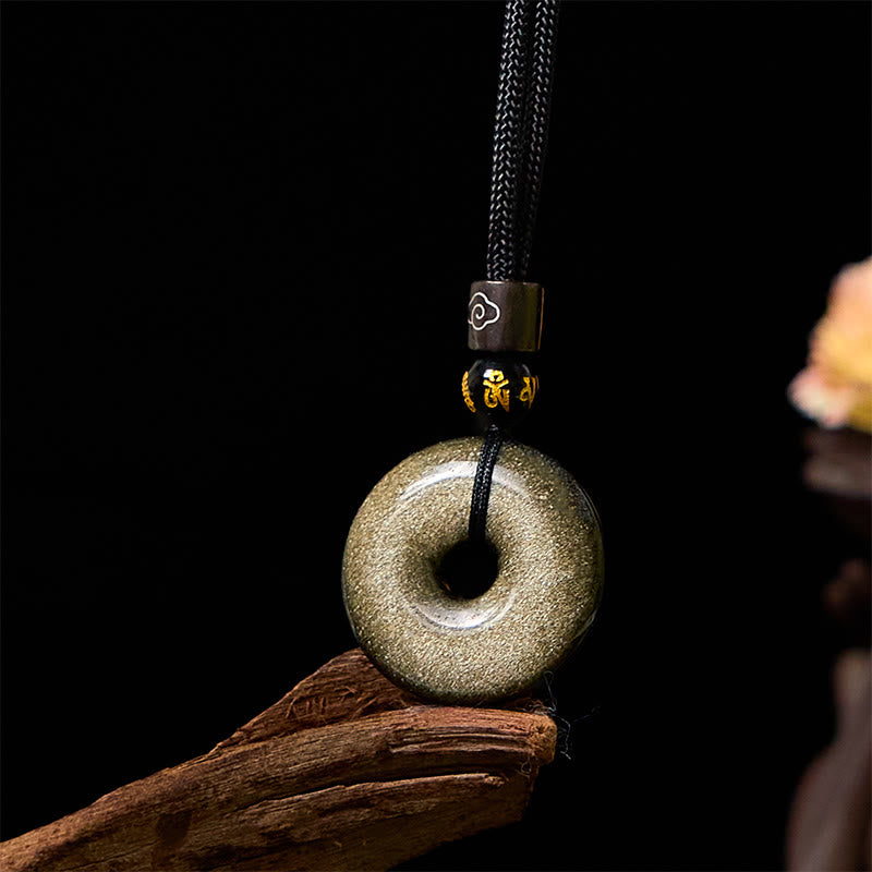 Goldfarbener Obsidian-Anhänger mit Peace-Schnalle und Stärke