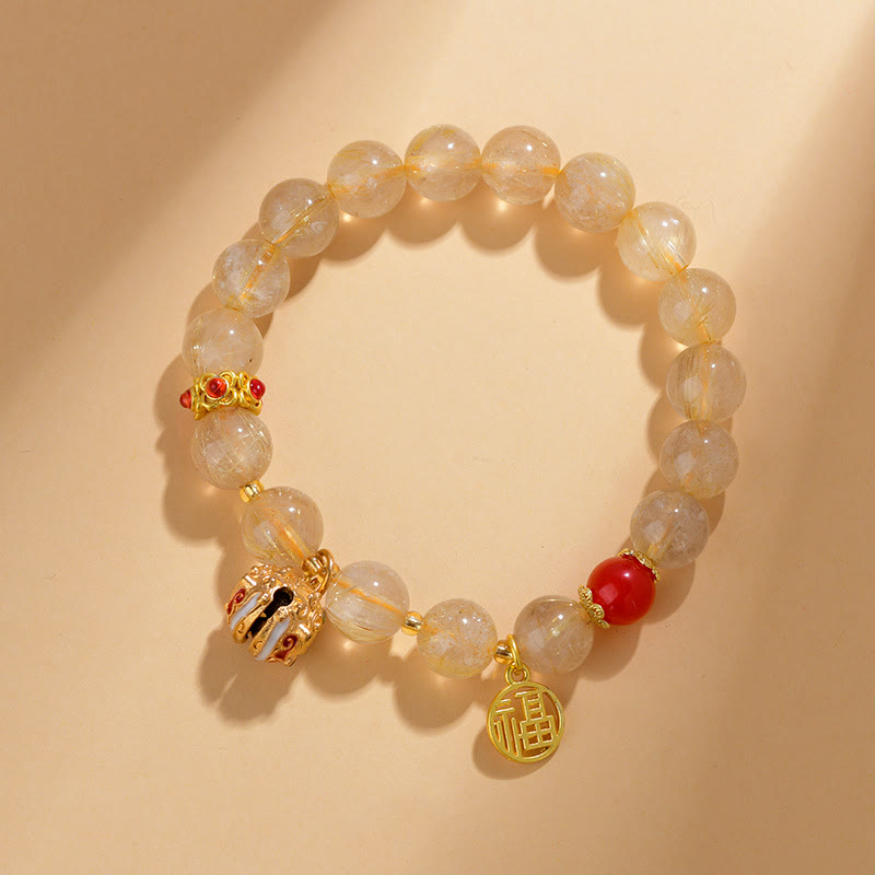 Goldenes Rutilquarz-Reichtumsarmband Fu Charm