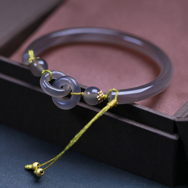 Spirituelles Armband aus grauem Achat mit Peace-Schnalle für Balance