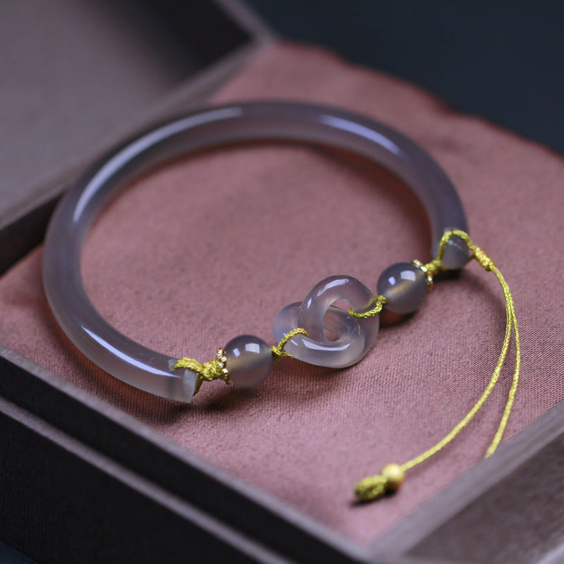 Spirituelles Armband aus grauem Achat mit Peace-Schnalle für Balance