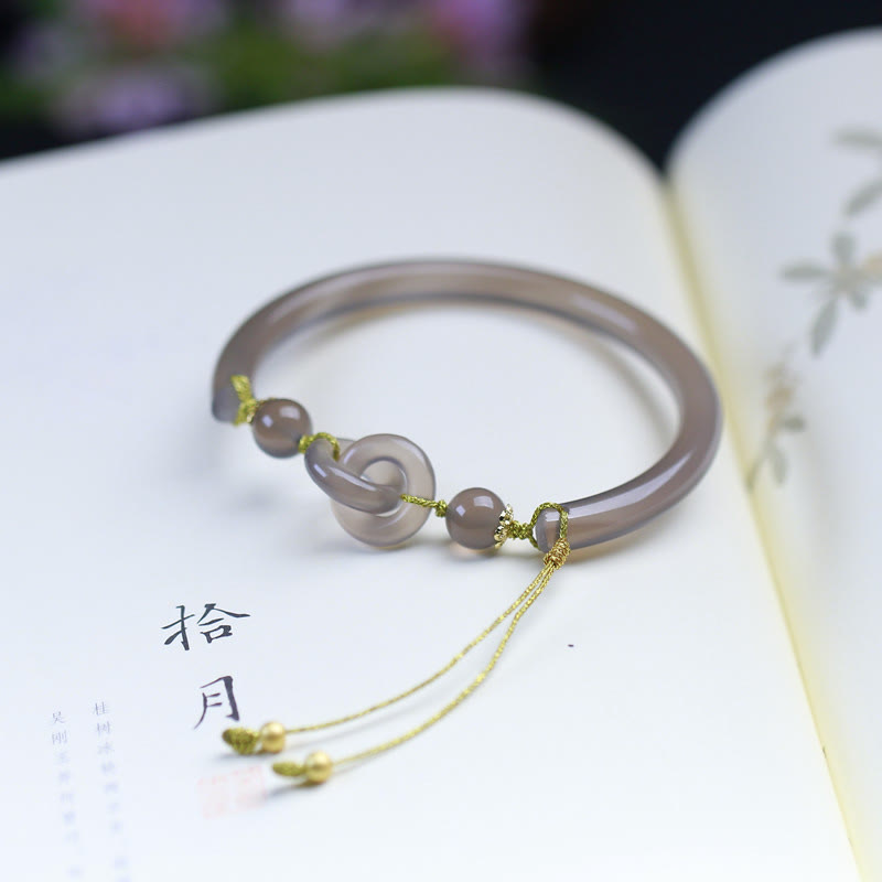 Spirituelles Armband aus grauem Achat mit Peace-Schnalle für Balance
