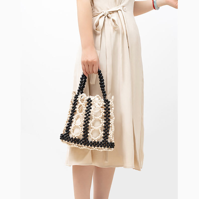 Handgewebte Handtasche mit runden, hohlen Holzperlen – Bohemian-Stil