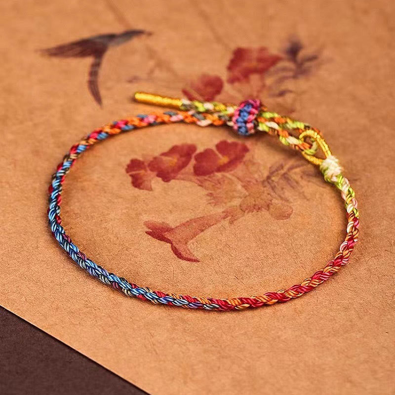 Handgefertigtes buntes Armband aus rotem Seil für Glück und Schutz