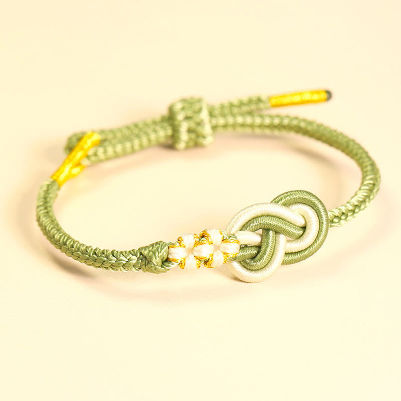 Handgefertigtes Peace-Knoten-Armband mit acht Fäden und roter Schnur